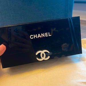 CHANEL tissue box with drawer.   Bought and never used.    Nice black acrylic.